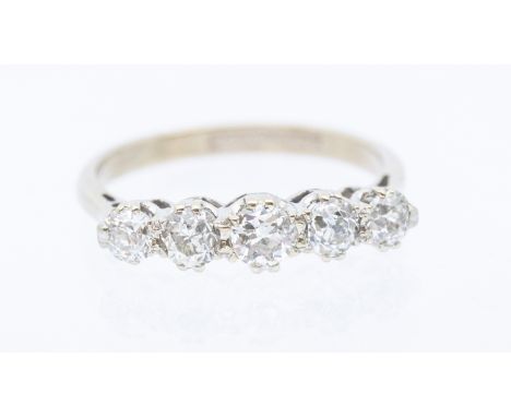 A five stone diamond 18ct gold ring, (rhodium plated) comprising five old cut claw set diamonds, total diamond weight approx 