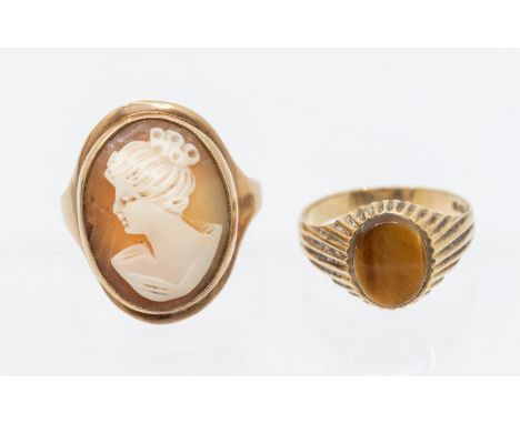 A 9ct gold cameo ring, oval design, width approx 22mm, size S, along with a tigers eye agate set 9ct gold ring, width approx 