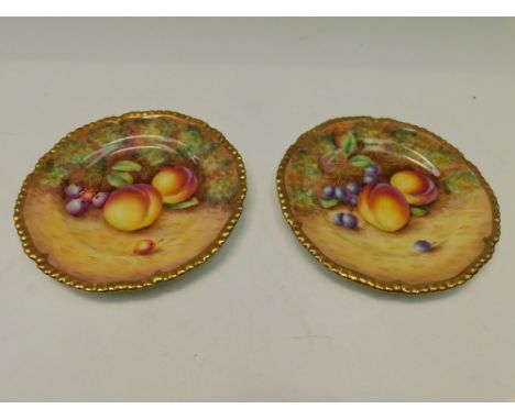 Two Royal Worcester Mid 20th Century rope edged Tea plates , decorated with fruits both signed P English, Factory marks to ba