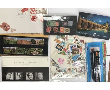Collection of Stamps of First Day Covers, Commemorative sets and loose World stamps with a Ertl toy Train cased &lsquo;Dougla