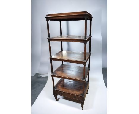 A late George IV mahogany tall five shelf wotnot with single base drawer and gallery top.