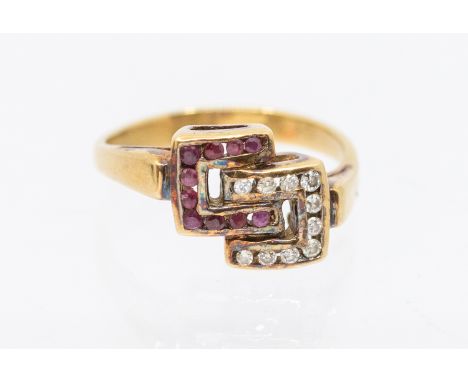 A ruby and diamond set gold ring, comprising an interlocking C channel set with diamond and rubies, width approx 9mm, size K,