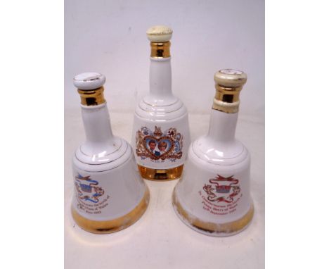 A Bells Scotch Whisky decanter commemorating the birth of Prince Henry of Wales 1984 together with two further Royal commemor