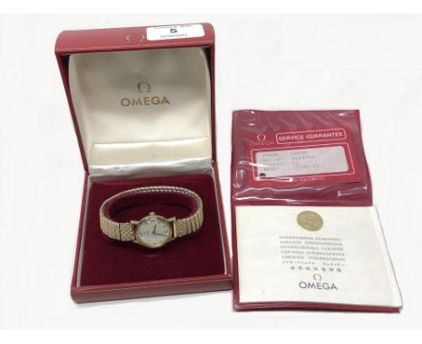 A Lady's 9ct Gold Omega Wristwatch, silvered dial with Arabic numerals, later crown, calibre 620 17 jewel manual-wind movemen