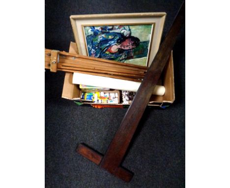 A box of artist's equipment including easel, paints, T-square, framed portrait study of a woman 