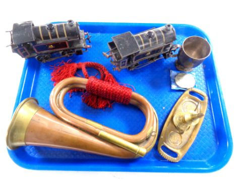 A tray of two tin plated locomotives, copper and brass bugle, plated mug, two Crowns etc 