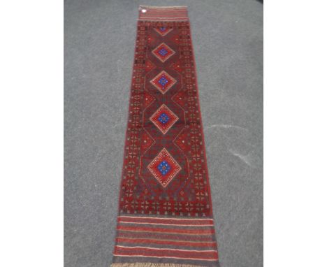 A Meshwani runner 215cm by 57cm
