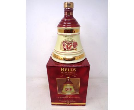 A Bells Extra Special Old Scotch Whisky decanter - Christmas 1996, sealed in box.