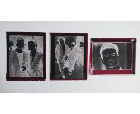 Vintage negatives of George Michael in the Wham days and 1990 (5x4 inches), with full ticket with stubs for Robbie Williams 2