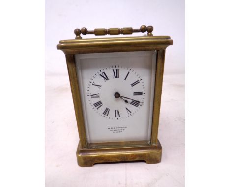 A brass cased carriage clock signed H W Bedford, 57 Regent street, London.