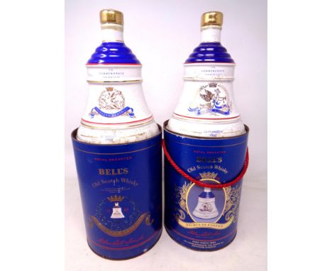 Two Bells Old Scotch Whisky decanters commemorating the birth of Princess Beatrice and Eugenie, both sealed in boxes. (2)
