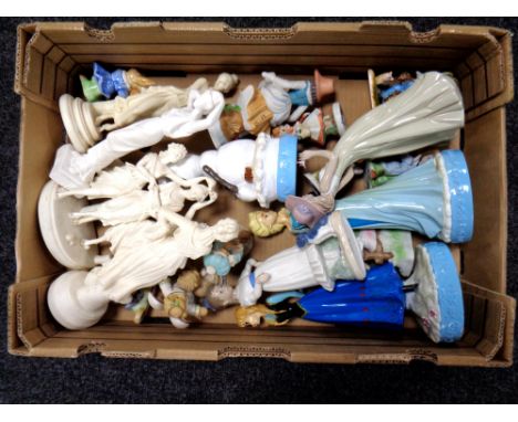 A box of various figures including Nao, Disney etc 