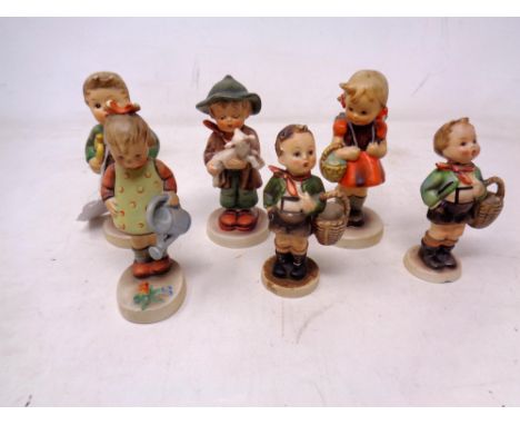 A group of six Goebel figures of children 