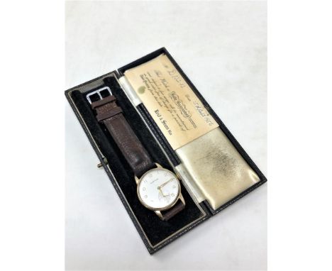 A Gent's 9ct Gold Certina Wristwatch, silvered dial with gilt Arabic numerals, subsidiary seconds, gold-plated crown, inscrip