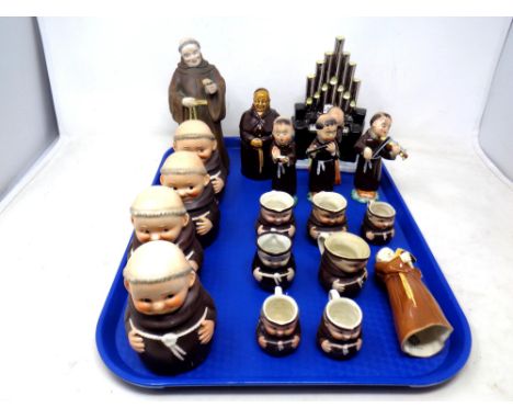 A tray of West German Goebel monk character jugs, Royal Worcester monk figure and Italian monk musician group 
