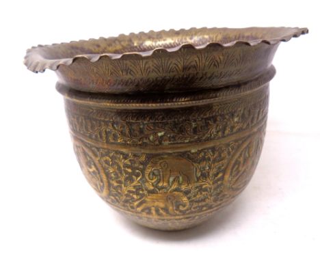 A 19th century Indian embossed brass planter 