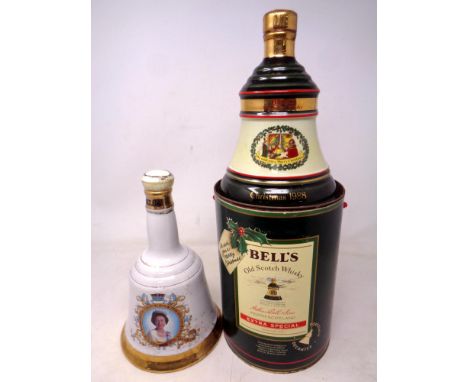 A Bells Old Scotch Whisky decanter - Christmas 1988, sealed in box together with another Bells decanter 'The Queen's 60th Bir