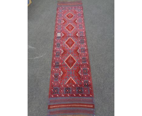 A Meshwani runner 251cm by 63cm