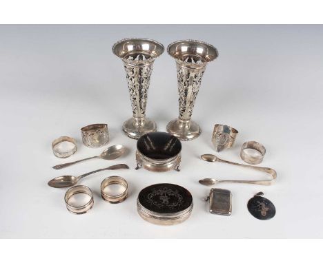 A pair of Edwardian silver vases of tapering cylindrical form with pierced decoration, on a circular foot, Birmingham 1902 by