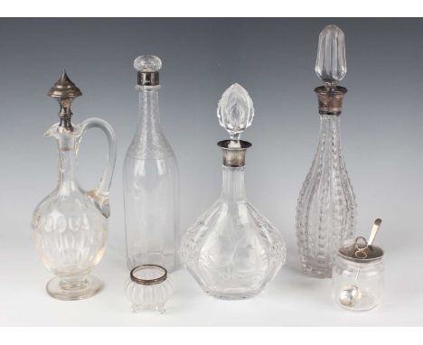 A George V silver mounted cut glass decanter and stopper, decorated with opposing panels of fruit, Birmingham 1932 by John Gr