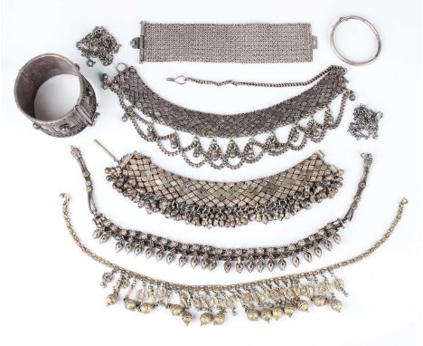 A group of Asian and other white metal jewellery, comprising a wide woven mesh bracelet, detailed ‘JV’, length 17.5cm, a wide