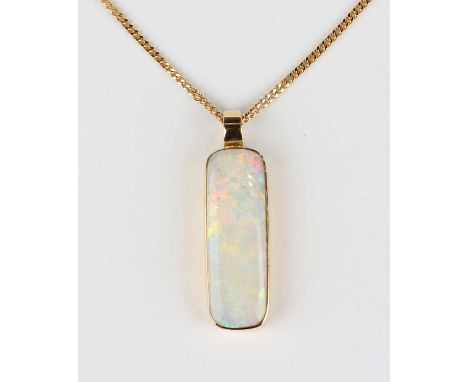 An 18ct gold and opal single stone pendant, mounted with a curved rectangular opal, length 2.9cm, with an 18ct gold curblink 