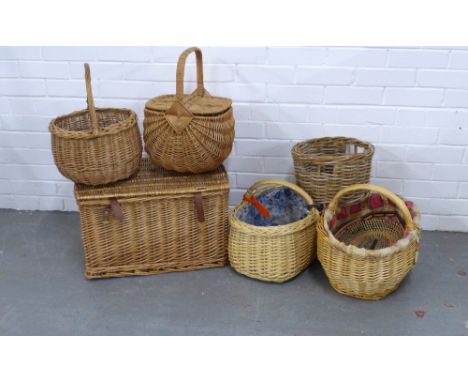 Six wicker baskets to include a hamper shaped basket together with a small African basket (7) . 