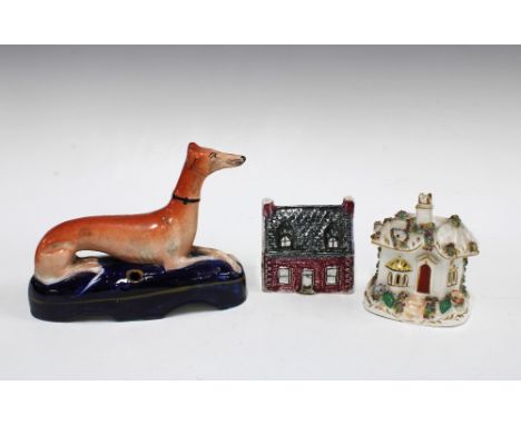 Staffordshire hound quill / pen holder, 19 x 14cm, a Staffordshire pottery house money bank and a cottage pastille burner (3)