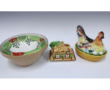 Pottery hen on nest, together with a house shaped butter dish, a vegetable decorated bowl and a Mason Cash mixing bowl 26 x 1