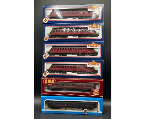 Six Boxed BR Crimson/Maroon Suburban Coaches, OO gauge(1000g)Includes:- (Bachmann Branchline unless stated)â€¨34-625 57' BR M