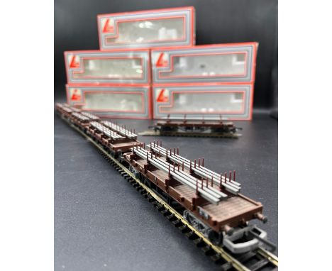 A rake of six Lima 305630W BR Bogie Bolster Wagon BEV with Rail Load(600g)Five boxed'Ready to Roll'Showing dust -  Rolling-st