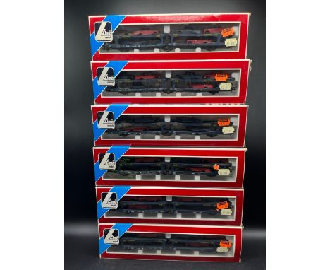 A rake of six boxed Lima Articulated vehicle transporters with vehicles and another(800g)Lima 309063 Goth Transports articula