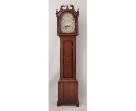 An early 19th century provincial oak longcase clock - the eight day, bell strike movement fronted by a painted arched Arabic 