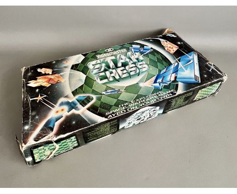 A boxed vintage Videomaster Star Chess TV video game, 1980s - appears complete, in the original box, with mains power supply.
