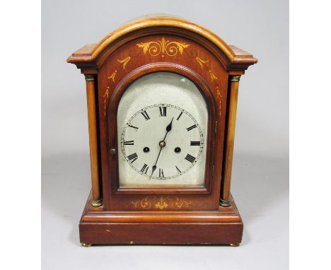 Edwardian walnut bracket type clock with arched, engraved steel dial, Roman numerals and twin train movement striking on an o