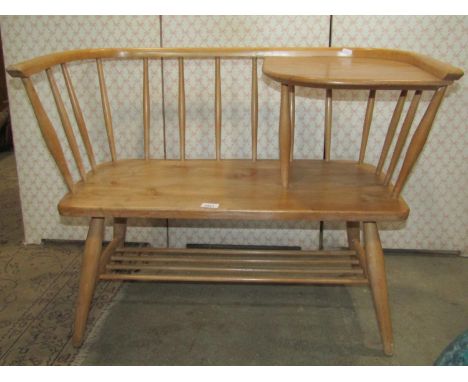 An Ercol style colonial telephone/hall bench elm and beechwood 