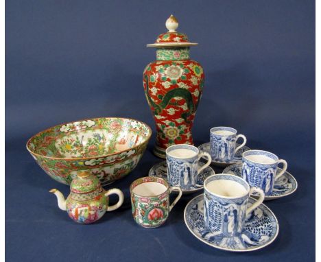 An oriental vase and cover of shouldered form with polychrome panted dragon and flaming pearl decoration in red, green and gi