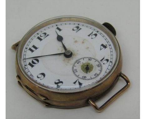 1930s 9ct lug watch head with jewelled movement, the enamel dial with subsidiary second dial, currently running, 33mm case, 2