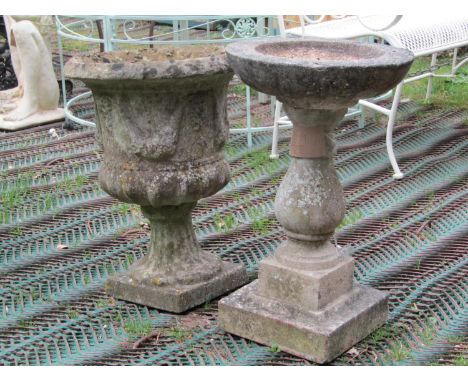 A reclaimed campana shaped planter with swag detail, fluted column and square cut base, together with a bird bath on a pedest
