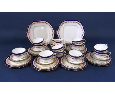 A collection of Hammersley China teawares with rose border decoration comprising a pair of cake plates, milk jug, sugar bowl 