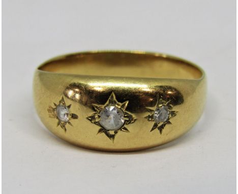 Yellow metal star cut gypsy ring, set with three white stones (one side stone a diamond), size L, 2.7g