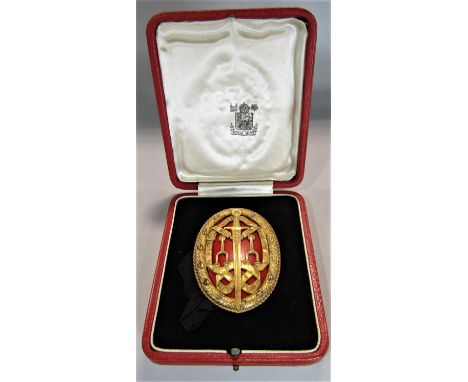 Royal Mint silver gilt knight bachelor award medal, with gilt pierced sword and ribbon decoration with red enamel ground, 7 x