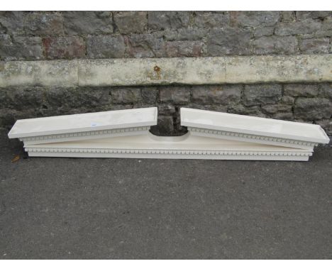 A cream painted architectural broken arched pediment with dentil and further moulded detail, 168cm long x 16cm wide x 26cm hi