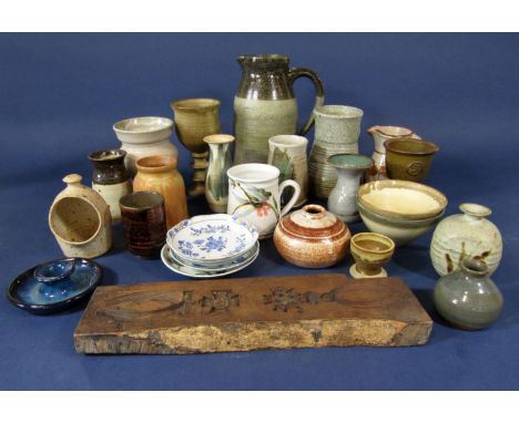 A collection of Studio pottery wares  including a jug with two tone glaze and pinched detail to base of handle, 24 cm tall ap
