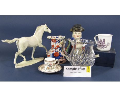A 19th century Staffordshire Toby jug of usual form 23 cm tall approximately, together with three 19th century ironstone type