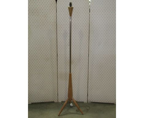 A retro style standard lamp with beechwood rocket shaped splayed tripod base and supports, 154cm high excluding fitting (poss