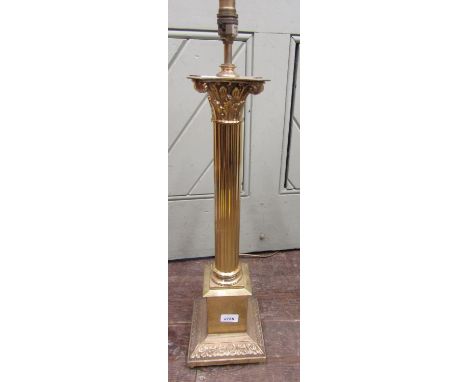 Cast brass Corinthian column table lamp on a square cut plinth fitted for electricity, 70 cm high 