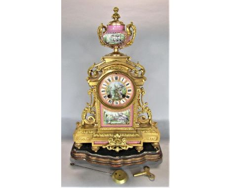 Good quality French ormolu and Sevres porcelain panel clock, decorated with hand painted panels of cranes amidst reeds, mount