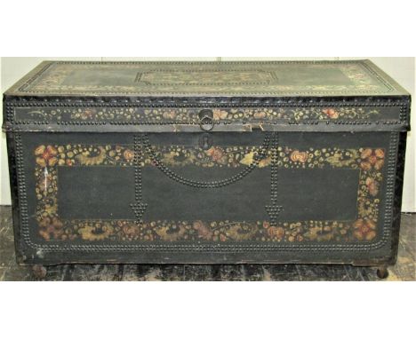 A Georgian camphor wood travelling trunk overlaid in green leather with brass stud detail, unusually decorated with repeating