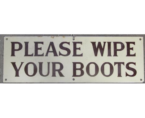 An small enamel sign of rectangular form with cream ground, brown lettering - Please Wipe Your Boots, 46cm x 15cm 
